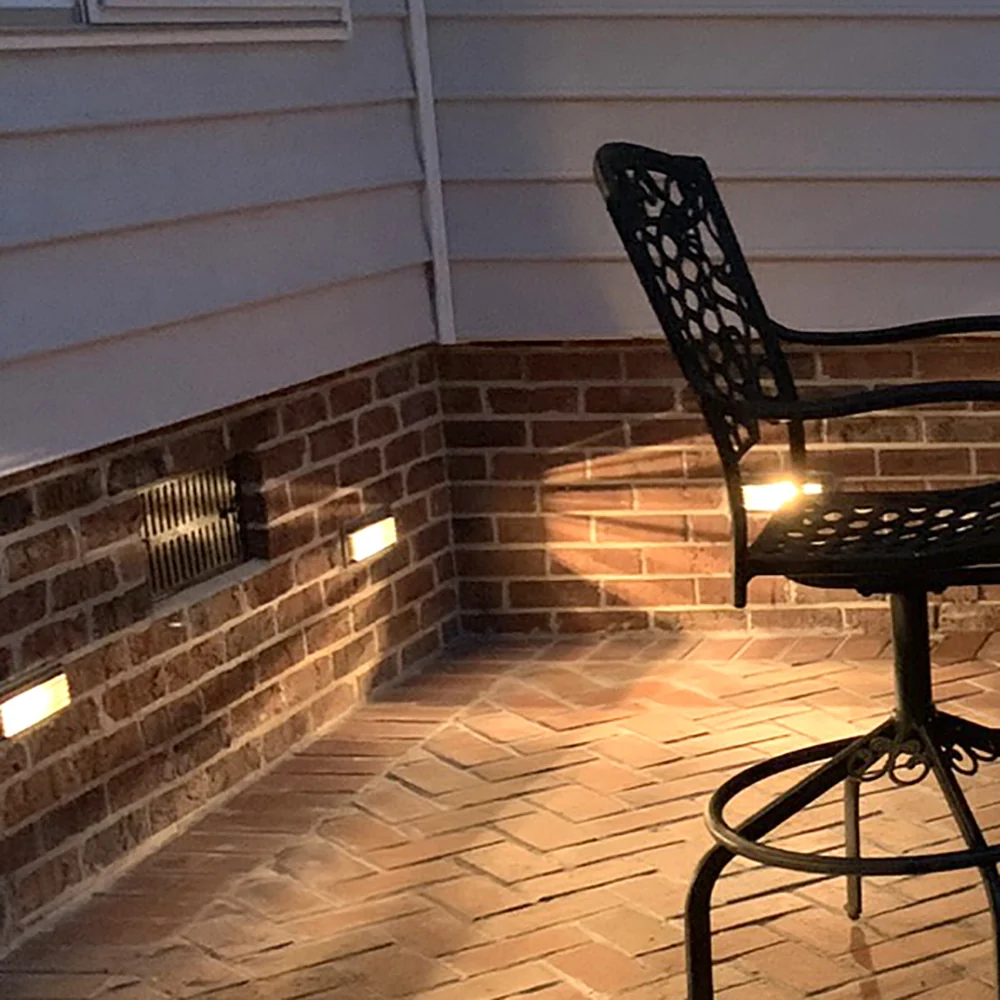 Outdoor louvered brick footlight